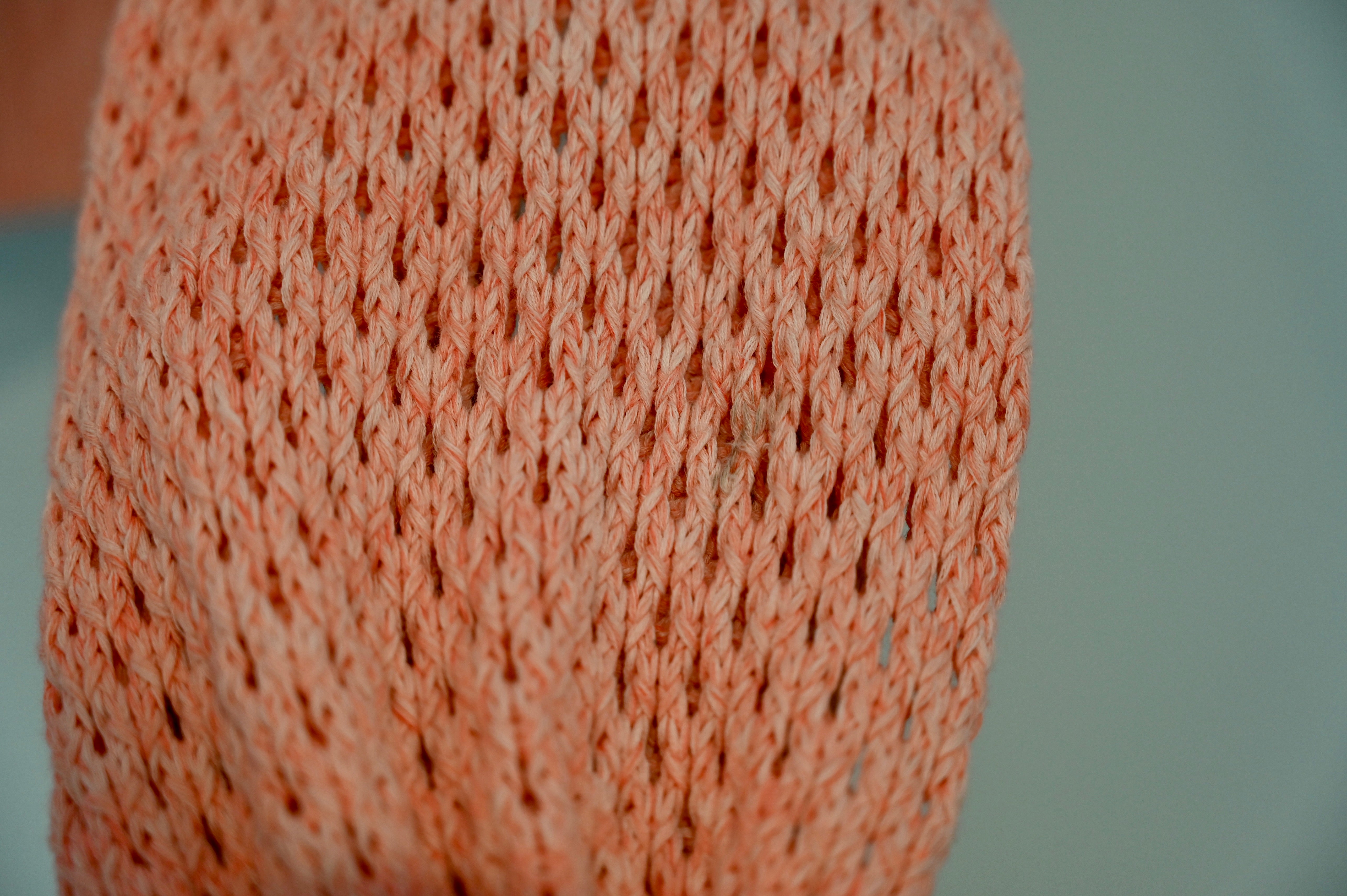 Salmon coloured outlet jumper